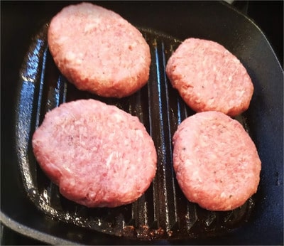 Cook the burgers Beef & Lettuce Burger