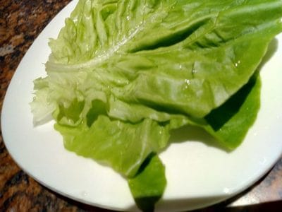 place a lettuce leaf or two and then add a slice of Mozzarella Beef & Lettuce Burger