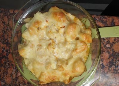 Slide the casserole into the preheated oven until the top gets light brown Cheesy Roasted Cauliflower