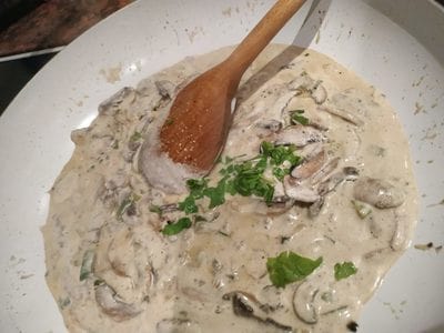 Over medium heat mix well until the mushroom sauce thickens Cognac Chestnut Mushrooms on Floating Zucchini with Asparagus