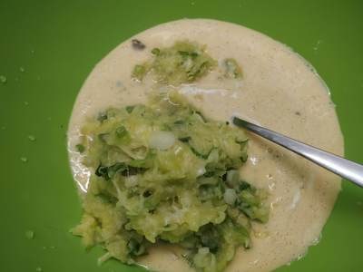 Stir in the fried Courgette scallions and garlic mixture Greek Style Courgette Casserole