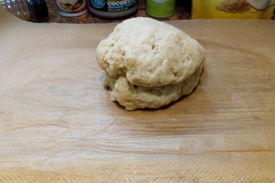 Prepare the working top for rolling your dough by covering it with parchment paper Poppy Seed Roll