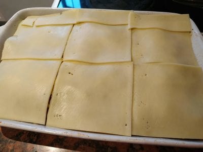 Layer of Edam cheese slices Beef & Eggplant Lasagne