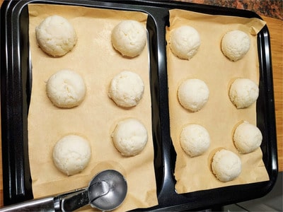 Place the coconut scoop on a baking sheet lined with parchment paper prepare to bake Coconut Macaroons