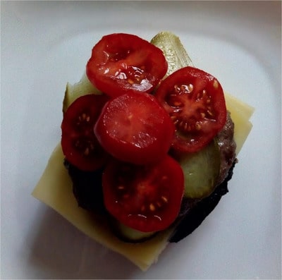 Add sliced tomatoes Flat Mushrooms Beef Burger