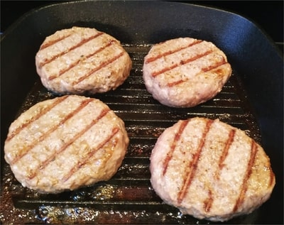 On the same grill, add the beef burgers and transfer under moderate heat for 18 minutes, turning occasionally Flat Mushrooms Beef Burger