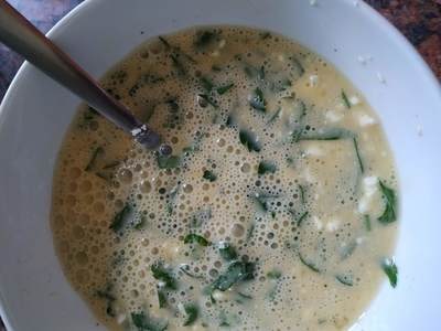 Stir in Chopped parsley and Greek cheese Greek Cheese and Parsley Omelette