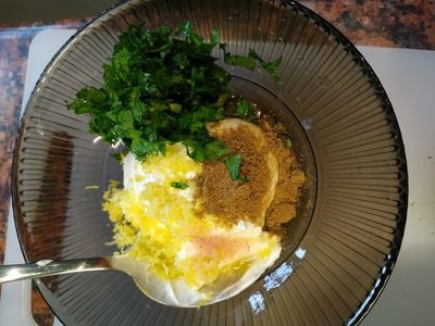 Add soured cream and stir in 1 tbsp garlic oil, lemon zest and juice, cumin, chopped parsley and then salt & pepper Grilled Eggplant with Soured Cream