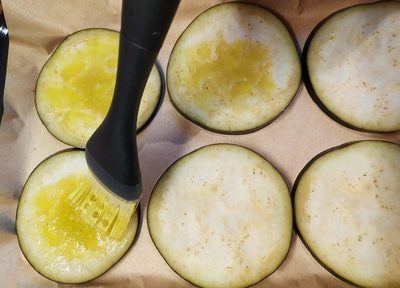 Brush each eggplant round with garlic oil Grilled Eggplant with Soured Cream