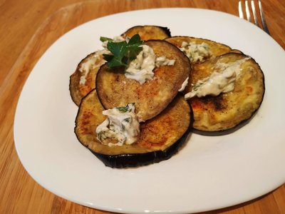 Sprinkle with the minced garlic and serve with sourced cream dip Grilled Eggplant with Soured Cream