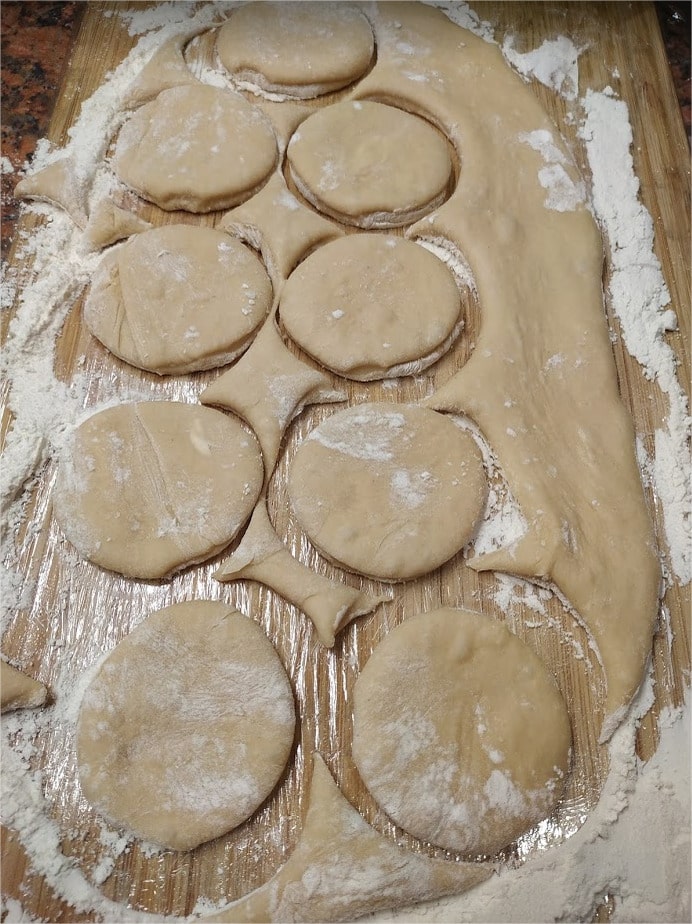 Cut the dough into round shapes using either a doughnut cutter or a glass My Grandma’s Doughnuts