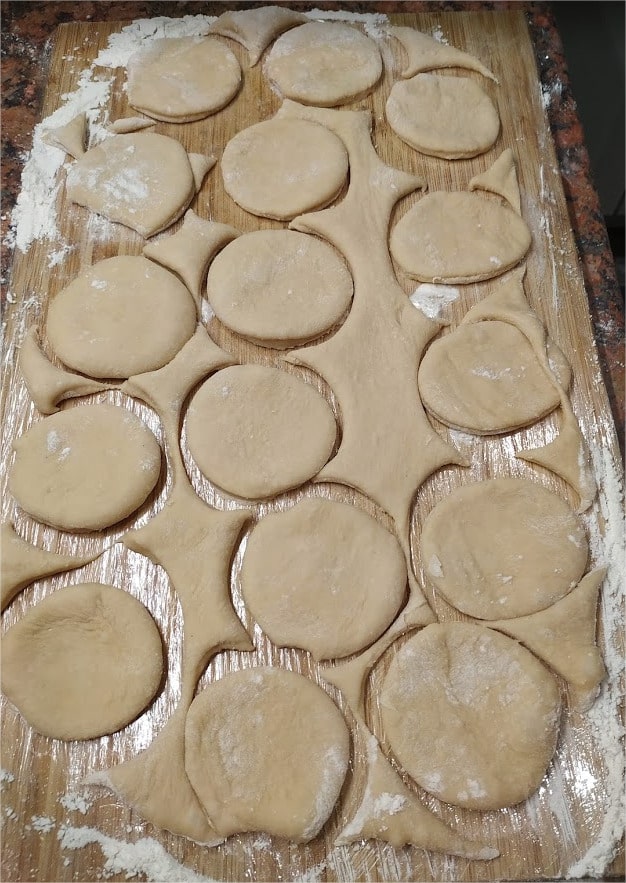 Knead the irregular cuts into anther dough ball and roll out the dough to make more doughnuts My Grandma’s Doughnuts