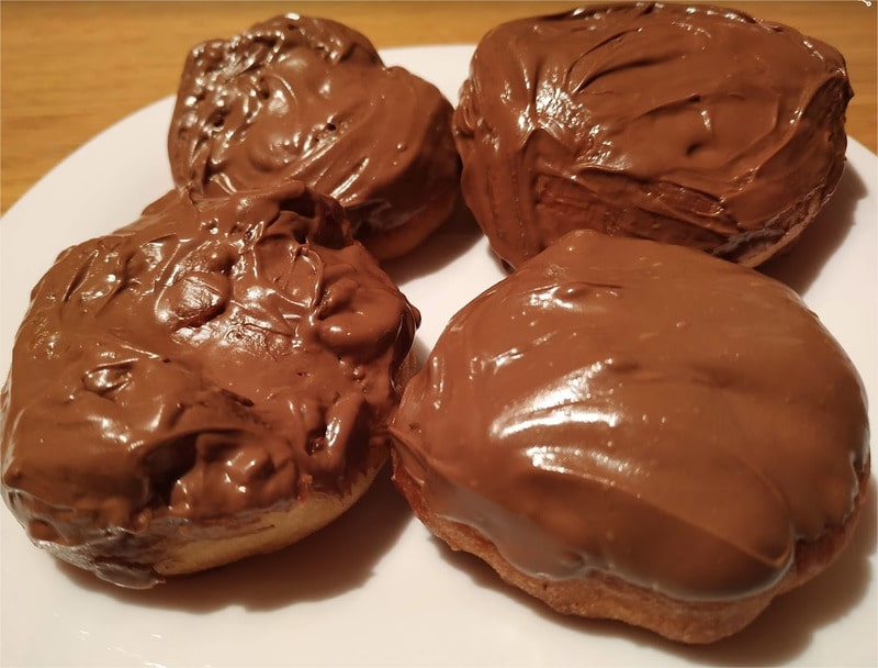 The doughnuts can be served coated with melted chocolate My Grandma’s Doughnuts