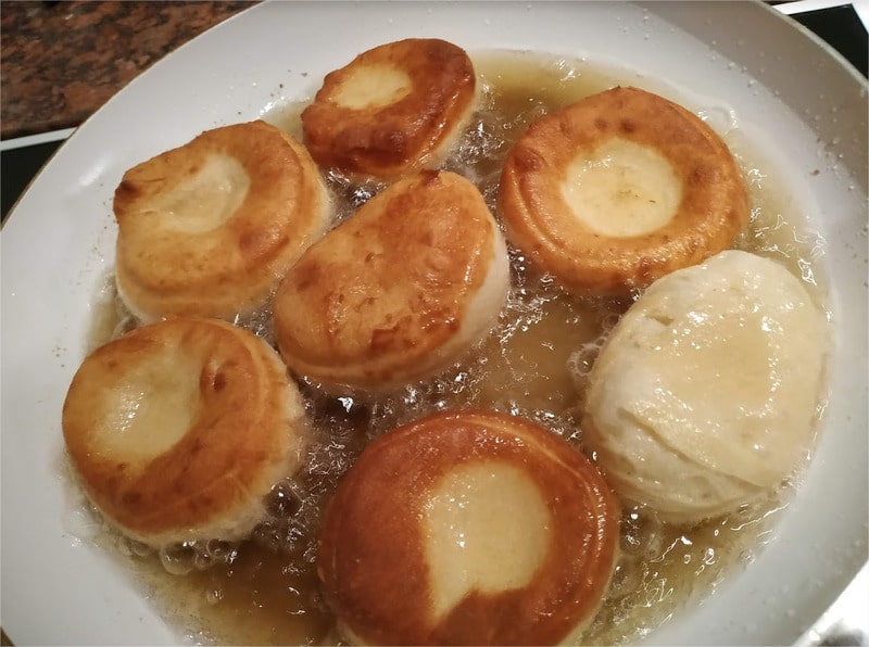 When golden brown on one side, flip the doughnuts over to cook on the other side My Grandma’s Doughnuts