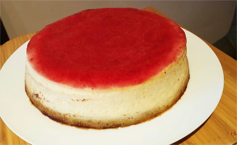 In a sauce pan, make a strawberry puree using the instructions for Strawberry Puree and add a thick layer on top of the cheesecake New York Strawberry Cheesecake