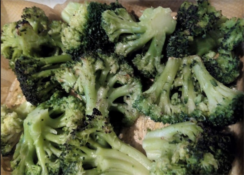 Sprinkle 2 tablespoons of olive oil and slide them into the oven for 25 minutes Roasted Broccoli Florets