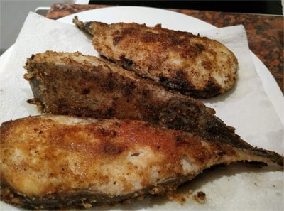 Place on paper towel to absolve the oil Southern Pan Fried Catfish