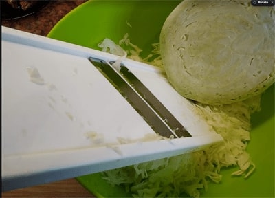 Slice thinly the cabbage and sprinkle with half tablespoon of pink salt Stewed Cabbage