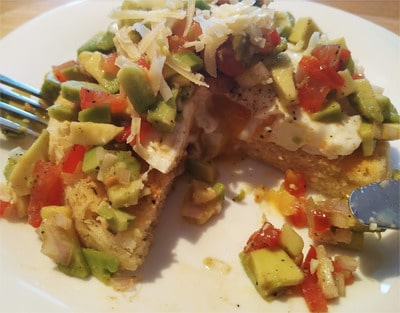 1 half toasted 90 second bread with classic guacamole, one poached egg and a sprinkle of cheddar cheese 90 Seconds Bread
