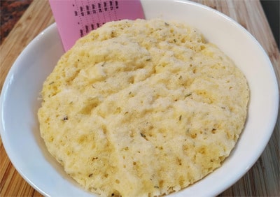 Remove it from Microwave oven and leave it to cool down for 2-3 minutes and after it has cooled down, using a spatula, remove it from the bowl 90 Seconds Bread