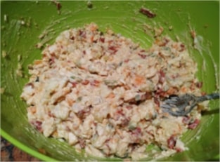 Add a tablespoon of yellow mustard and mix until all ingredients are well combined Boeuf Salad (Chicken and Potato Salad)
