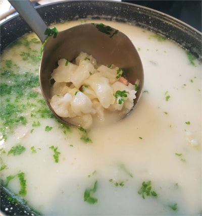 Remove from heat and continue to stir until the creme mixture is fully combined Cauliflower Florets Soured Soup