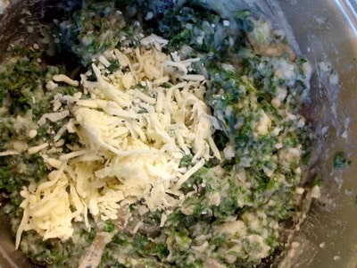 Stir in the eggs shredded mozzarella Parmesan chopped scallions chopped Kale pepper powder and dry thyme Cauliflower Kaleballs