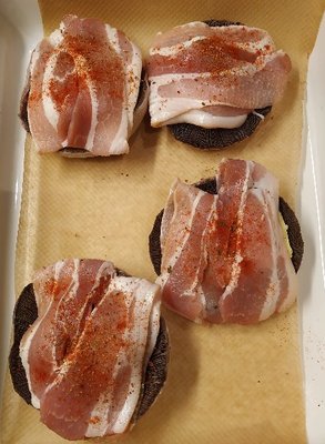 Sprinkle the mushrooms with smoked paprika powder for Cheesy Smoked Streaky Bacon Mushrooms