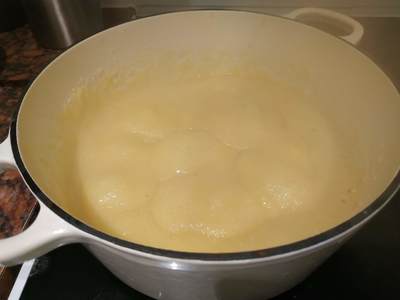 Stir until the mixture thickens and then reduce the heat Classic Creamy Polenta (Mamaliga)