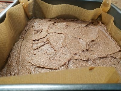 Coconut Brownies Pour the mixture and use the spatula to spread it evenly in the baking tray