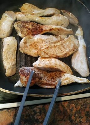 Cook the chicken until golden brown for Dijon Mustard Chicken & Courgette Rolls