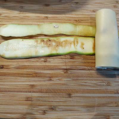 Roll the courgette strips for Dijon Mustard Chicken & Courgette Rolls