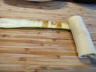 Roll the courgette strips for Dijon Mustard Chicken & Courgette Rolls