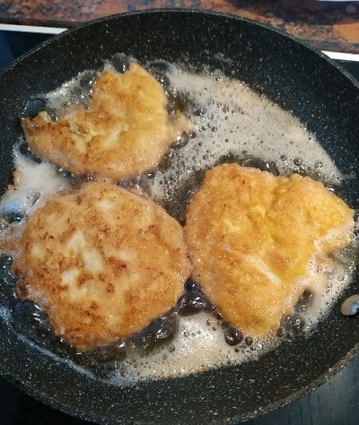 Fry it in a large frying pan for German Chicken Schnitzel
