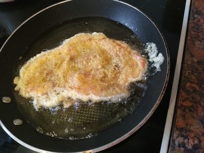 Fry each side German Pork Schnitzel with Coleslaw