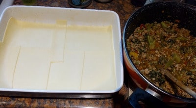 Lay the edam cheese slices for Keto Lasagna
