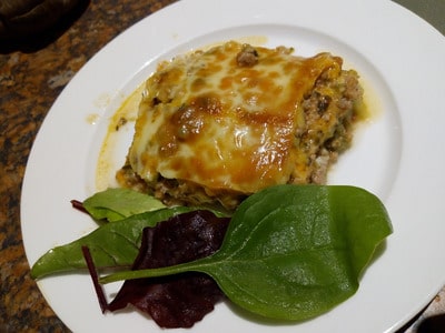 One Serving of Keto Lasagna served with sides
