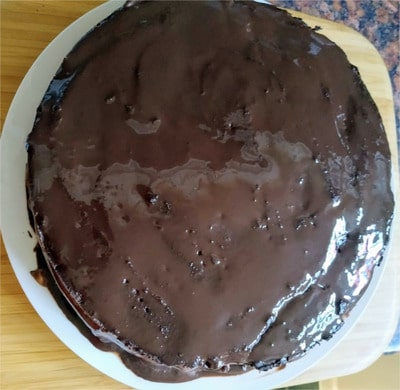 Add the second chocolate sponge on top Kids’ Favourite Chocolate Cake