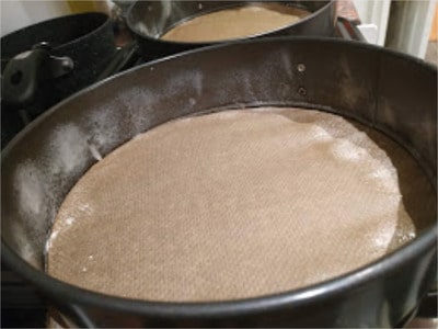 Line the bottom of two round springform cake tins with parchment paper and spray the sides with cooking oil Kids’ Favourite Chocolate Cake