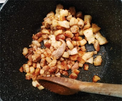 Remove the lid and keep them on medium heat for another 10 minutes until they get slightly golden brown Pork Belly Bites