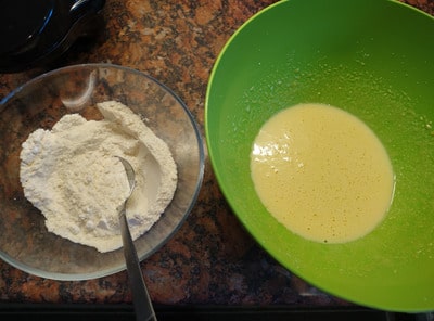 Mix the Flour and Eggs for Sweet Blueberry Waffles