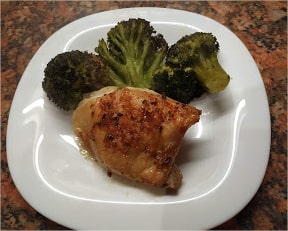 One roasted chicken thigh, roasted broccoli sprinkle with 1 tablespoon of grated mozzarella